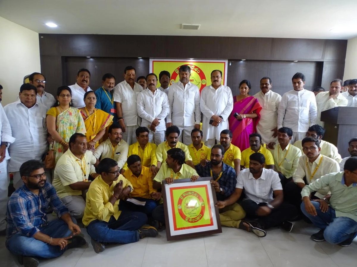 Telugu Desam Party Telangana leaders and iTDP members with the framed iTDP Telangana emblem