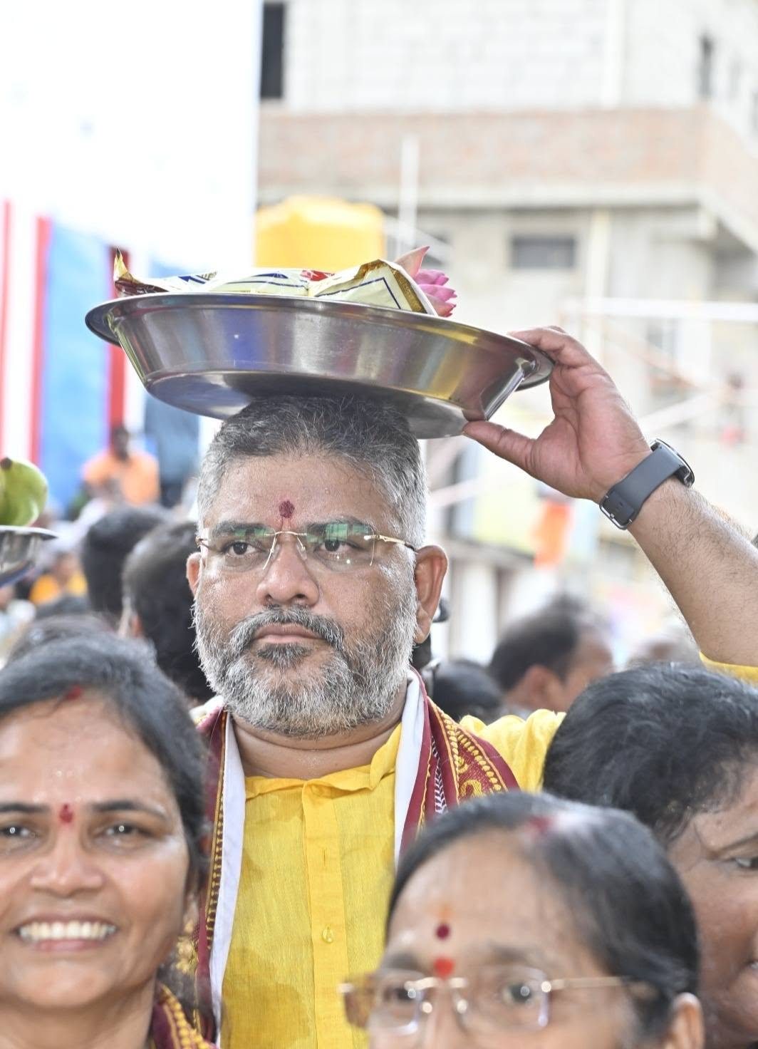 Talikota Hari Krishna carrying offerings at Sri Kamakshi Thayi temple, Jonnawada